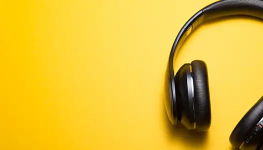 Headphone on yellow background
